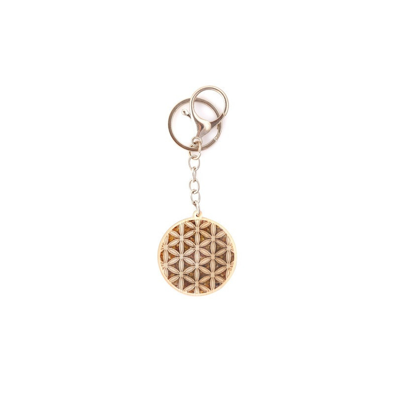 Porte clés fleur de vie en bouleau, métal et ambre, diamètre 4 cm