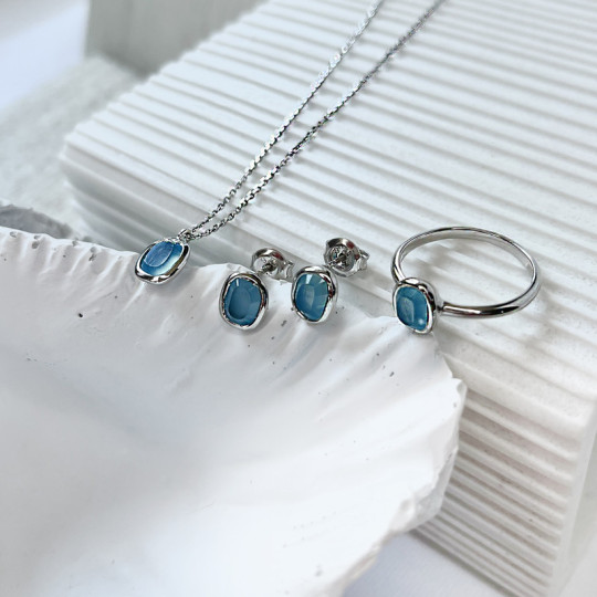 Bague en calcédoine bleue naturelle irréguliere, en argent 925 rhodié