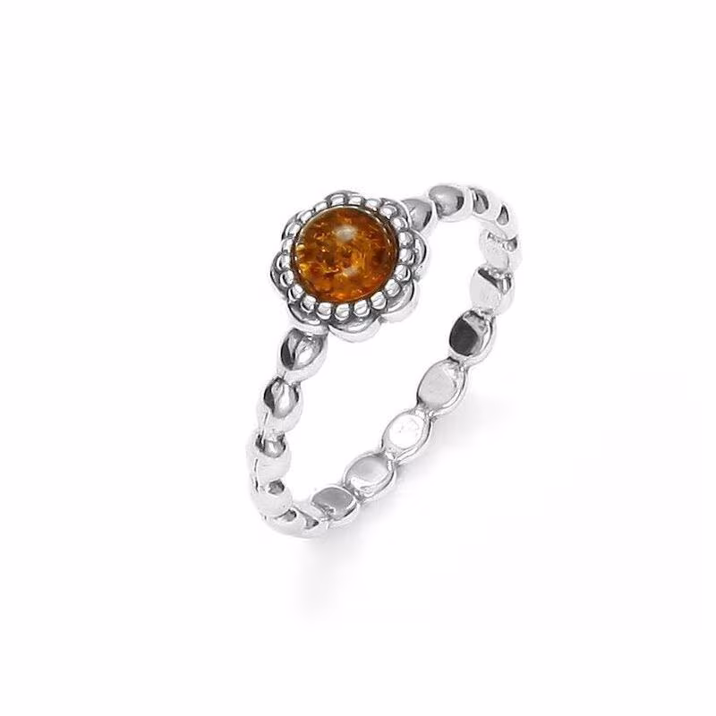 Bague fleur en ambre cognac naturel rond, en argent 925 rhodié