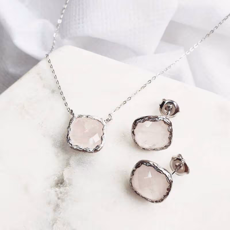 Cushion-cut natural rose quartz stud earrings in rhodium-plated 925 silver